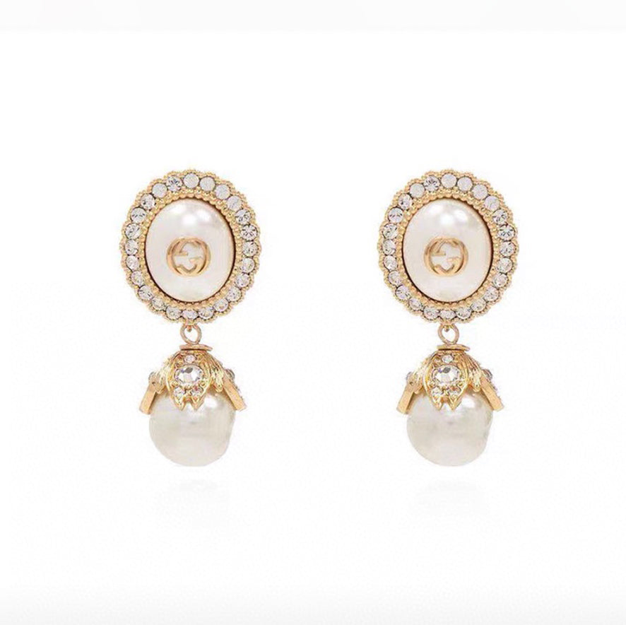 Gucci Double Pearl 18K Gold Earrings product image 1, provided for visual reference and product detail review
