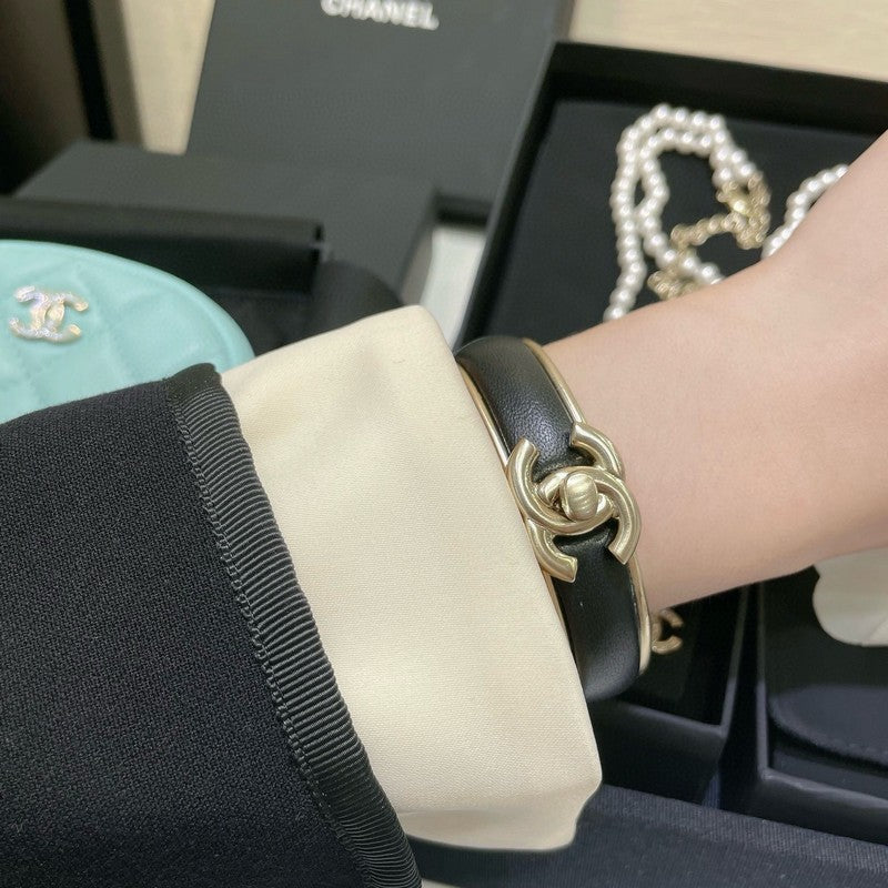 Chanel Black Leather Cuff 18K Gold Bracelet product image 9, provided for visual reference and product detail review