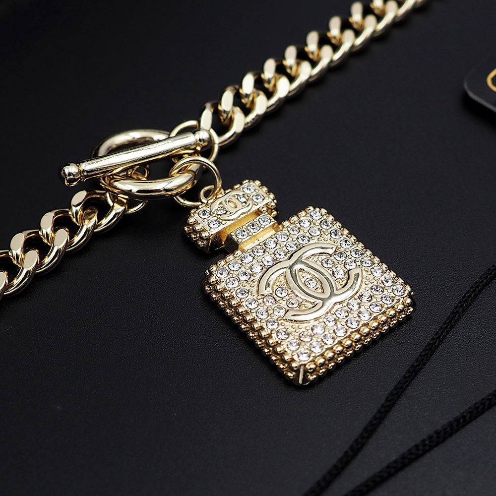 Chanel Diamond Perfume Bottle Pendant 18K Gold Necklace product image 6, provided for visual reference and product detail