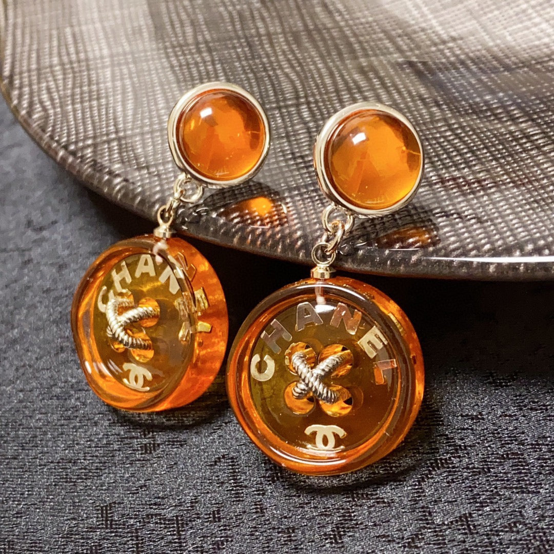Chanel Orange Pendant 18K Gold Earrings product image 2, provided for visual reference and product detail review