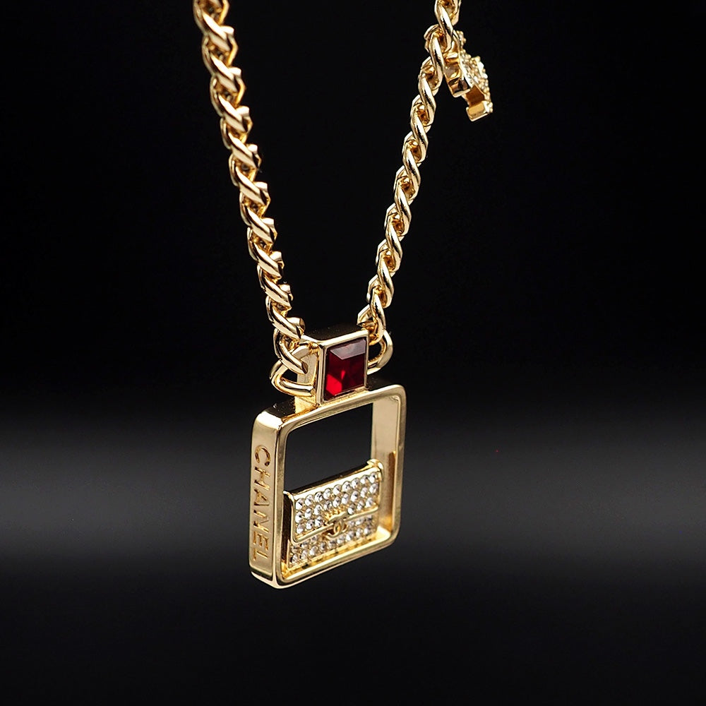 Chanel Red Bag Pendant 18K Gold Necklace product image 9, provided for visual reference and product detail review