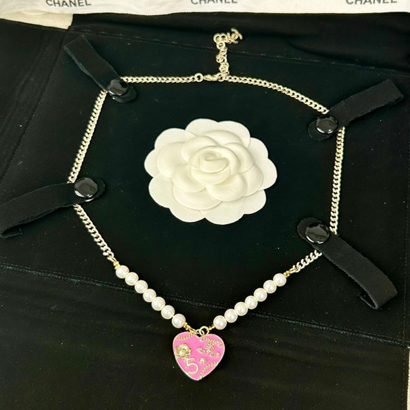 Chanel Pink & Black Heart Pearl 18K Gold Necklace product image 2, provided for visual reference and product detail review