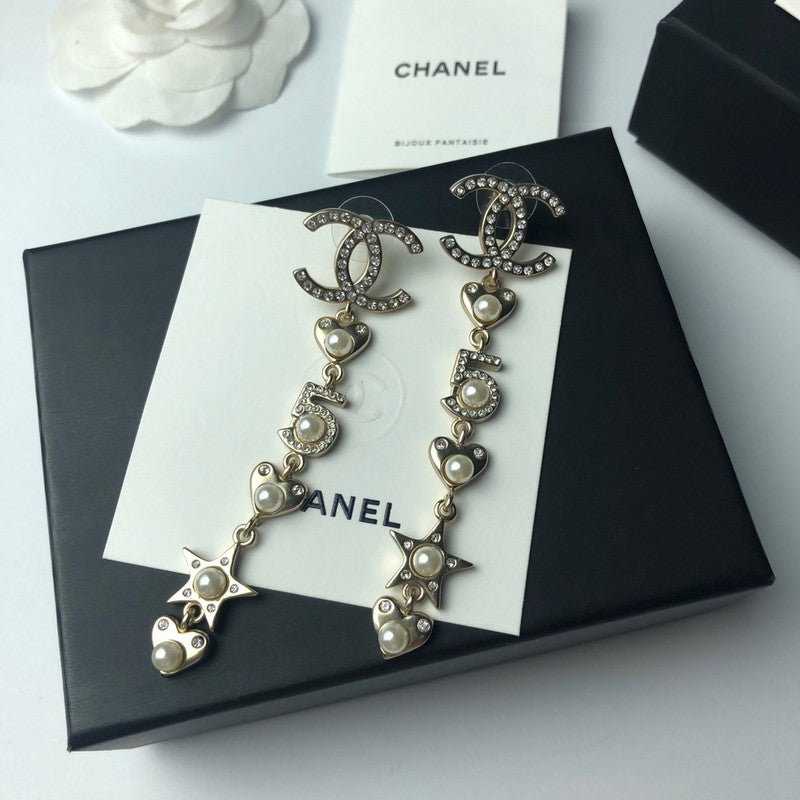 Chanel No.5 Long 18K Gold Earrings product image 9, provided for visual reference and product detail review