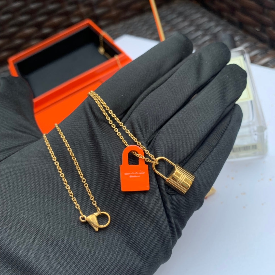 Hermes O'Kelly Orange Pendant 18K Gold Necklace product image 5, provided for visual reference and product detail review